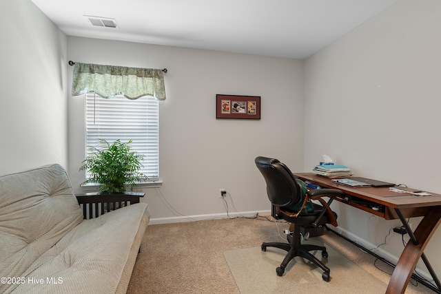 carpeted home office featuring baseboards and visible vents