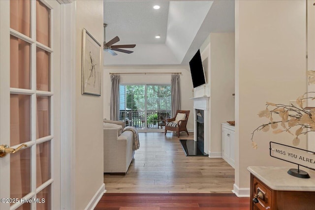 122 Smathers Dr, West End, NC 27376 - living room featuring ceiling fan, hardwood / wood-style flooring, a fireplace, recessed lighting, and baseboards