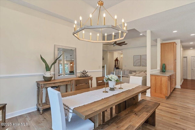 122 Smathers Dr, West End, NC 27376 - dining room featuring light wood-type flooring, baseboards, a chandelier, and recessed lighting