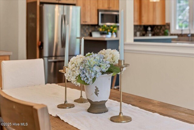 122 Smathers Dr, West End, NC 27376 - kitchen featuring stainless steel appliances, backsplash, and wood finished floors