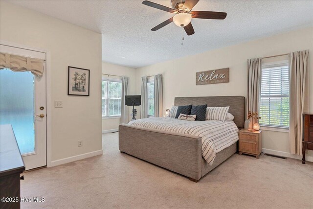 122 Smathers Dr, West End, NC 27376 - bedroom featuring carpet, baseboards, a textured ceiling, and ceiling fan