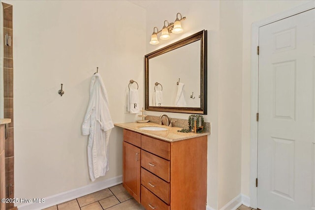 122 Smathers Dr, West End, NC 27376 - bathroom with baseboards, vanity, and tile patterned flooring