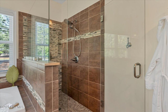 122 Smathers Dr, West End, NC 27376 - full bath featuring a stall shower and healthy amount of natural light