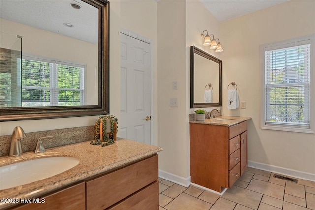 122 Smathers Dr, West End, NC 27376 - bathroom featuring vanity, baseboards, and tile patterned flooring