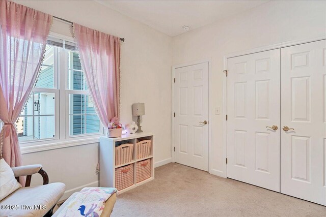 122 Smathers Dr, West End, NC 27376 - sitting room with light carpet and baseboards