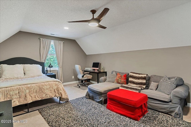 122 Smathers Dr, West End, NC 27376 - carpeted bedroom with vaulted ceiling, a ceiling fan, baseboards, a textured ceiling, and a desk