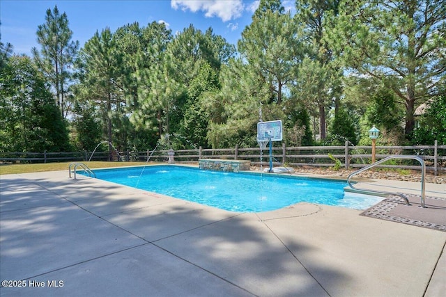 122 Smathers Dr, West End, NC 27376 - view of pool with fence, a patio area, and view of wooded area