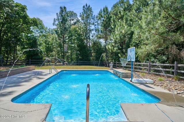 122 Smathers Dr, West End, NC 27376 - view of swimming pool with a patio area, a fenced backyard, and view of scattered trees