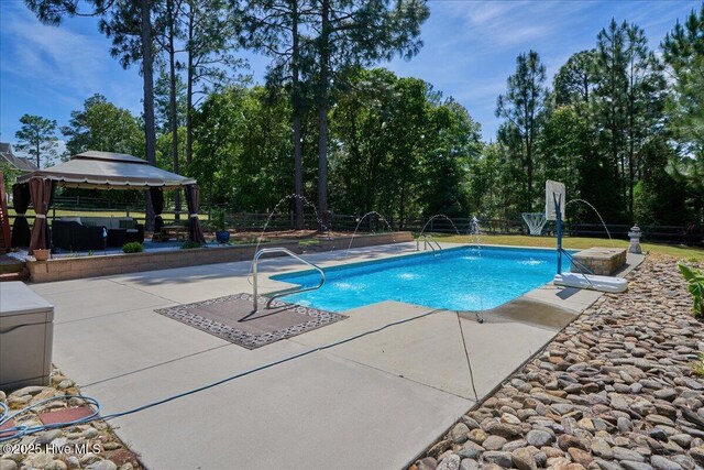 122 Smathers Dr, West End, NC 27376 - outdoor pool with a patio area, a gazebo, and fence