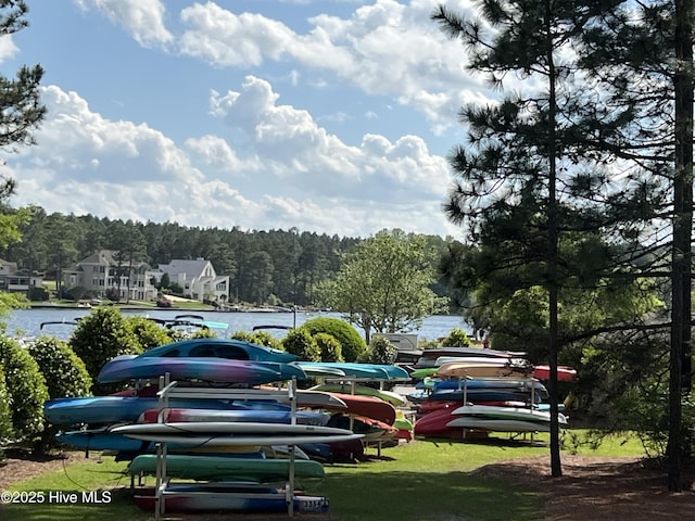 122 Smathers Dr, West End, NC 27376 - view of parking with a water view and a view of trees