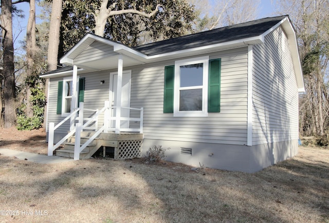 view of front of home with crawl space