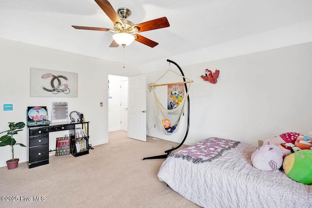 bedroom featuring light carpet and ceiling fan