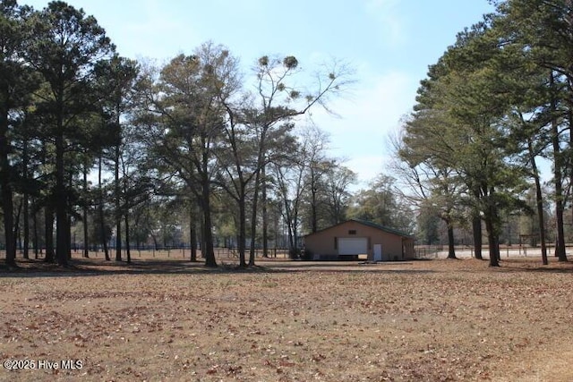 view of yard with a garage