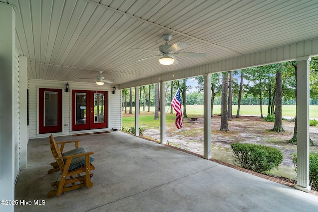 exterior space with ceiling fan