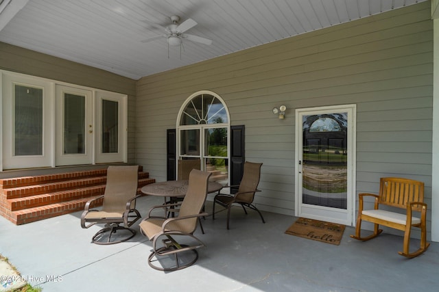 view of patio featuring ceiling fan