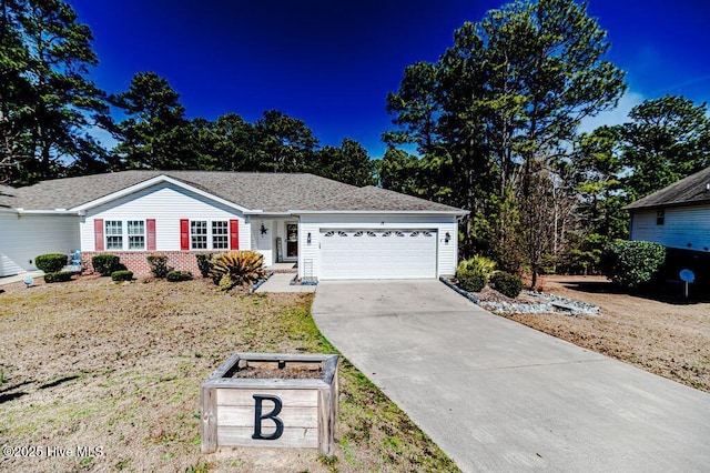 ranch-style home with concrete driveway, brick siding, and an attached garage