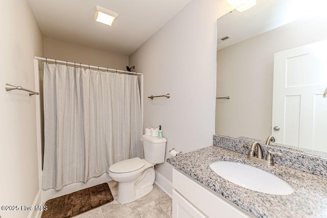 bathroom featuring visible vents, toilet, shower / bath combo, vanity, and baseboards