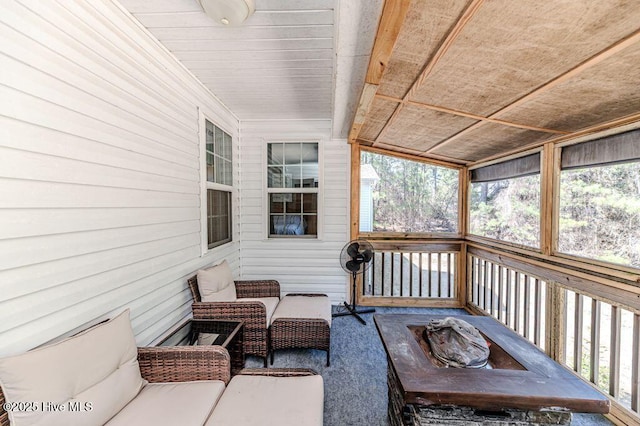 wooden deck with outdoor lounge area