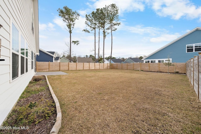 view of yard featuring a fenced backyard