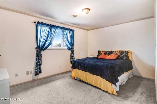 bedroom with ornamental molding, carpet flooring, visible vents, and baseboards