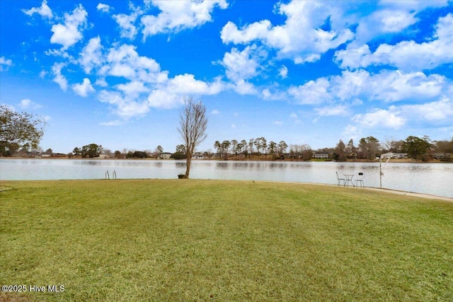 view of yard with a water view