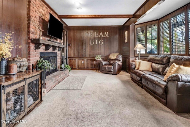 carpeted living area featuring a brick fireplace, beamed ceiling, and wood walls