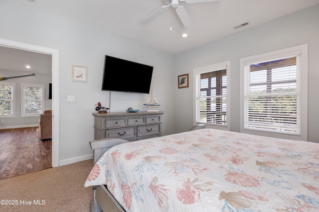 bedroom with recessed lighting, visible vents, carpet flooring, ceiling fan, and baseboards