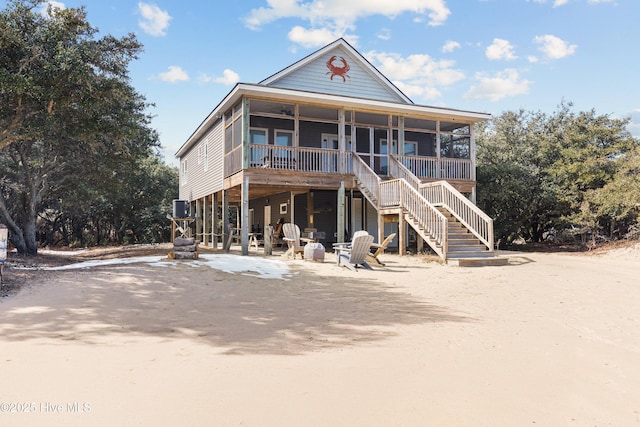 view of front of property with stairs