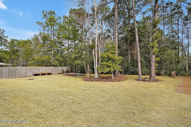 view of yard with fence