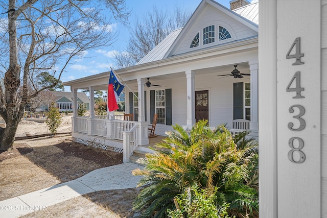 exterior space with covered porch and a ceiling fan