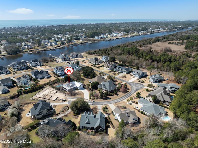 aerial view featuring a residential view and a water view