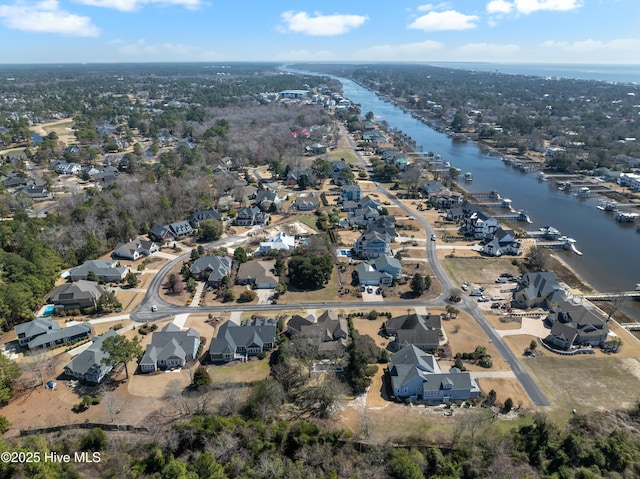 bird's eye view with a water view and a residential view