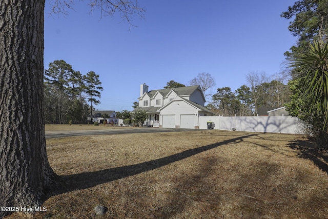 view of yard featuring fence