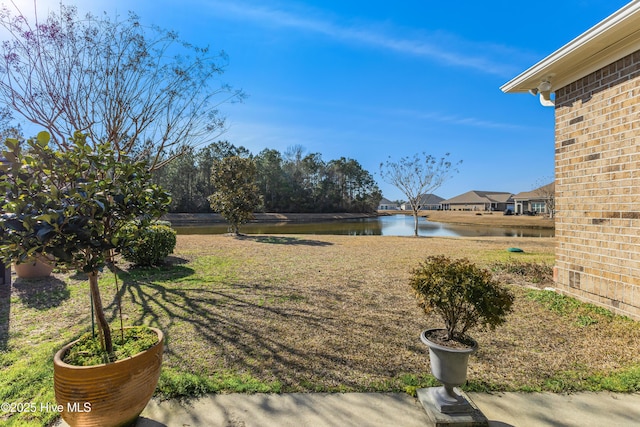 view of yard with a water view