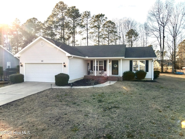 ranch-style house with a garage, a front yard, driveway, and a porch