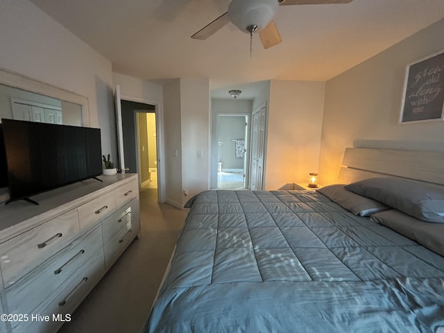 bedroom with ceiling fan and baseboards