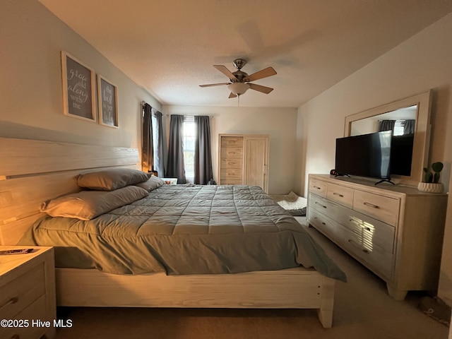 bedroom featuring a ceiling fan and carpet flooring