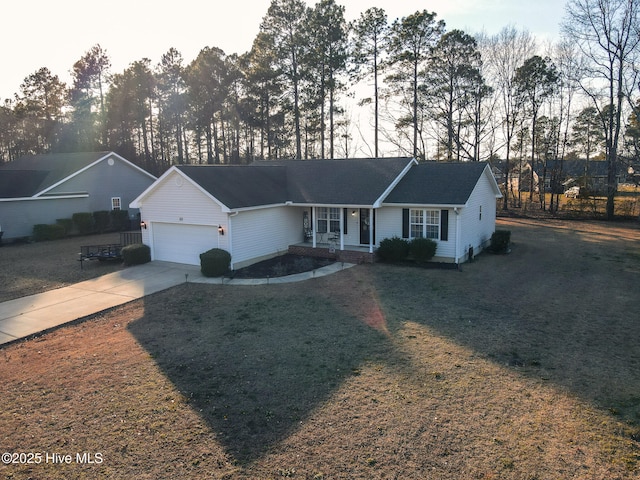 ranch-style home with driveway and an attached garage