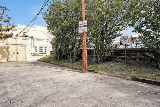 view of street with curbs