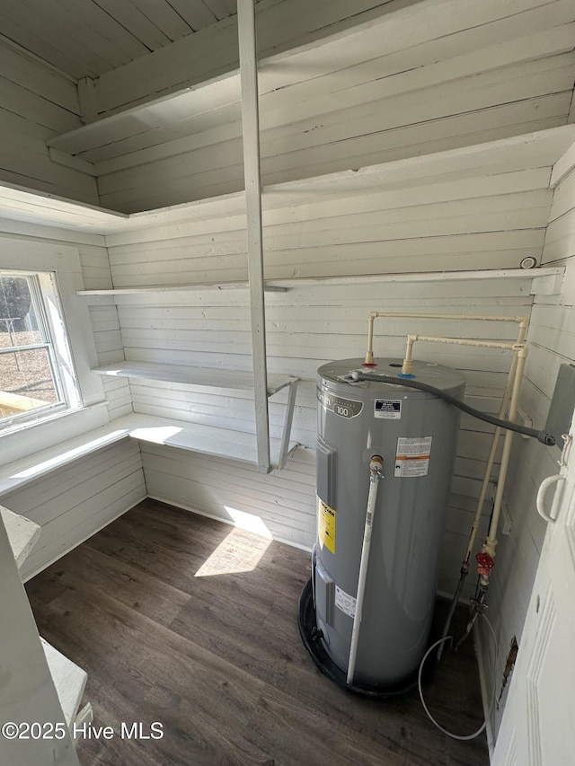 utility room with water heater