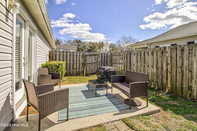 view of patio / terrace with fence