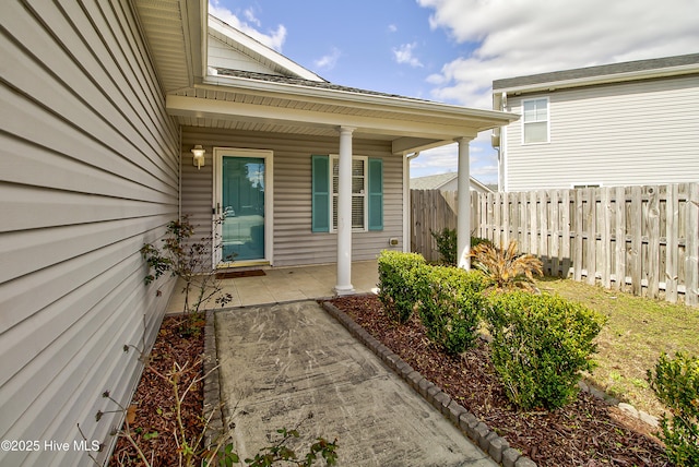 property entrance featuring fence