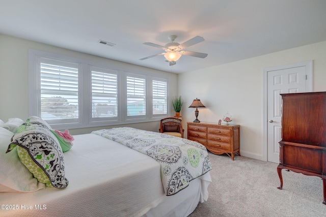 bedroom featuring carpet, ceiling fan, and baseboards