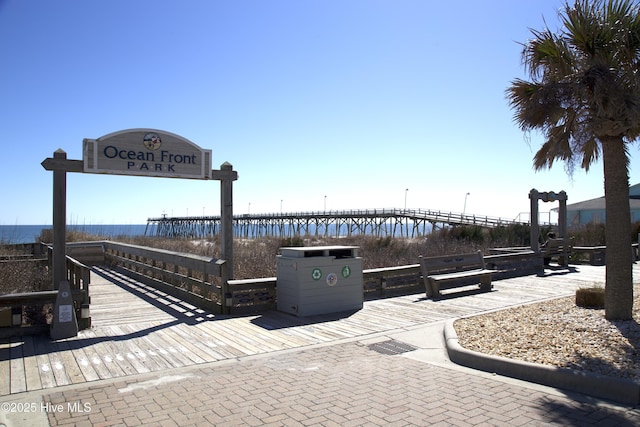 view of home's community with a water view