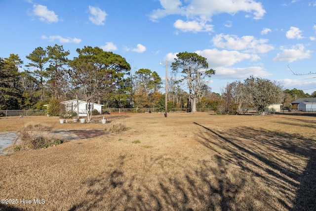 view of yard with fence