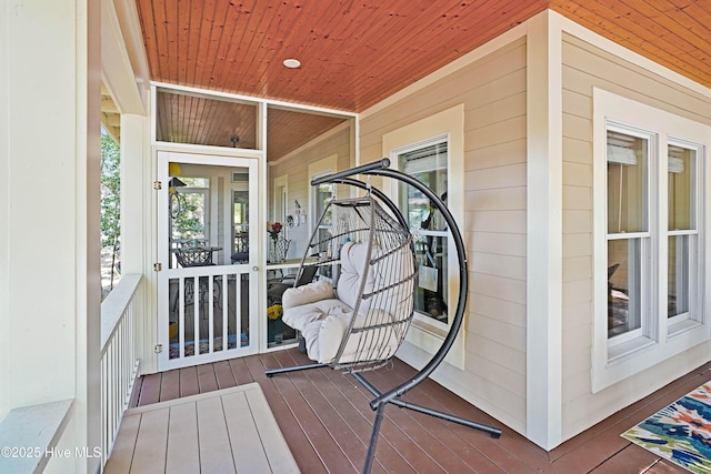 wooden deck featuring covered porch