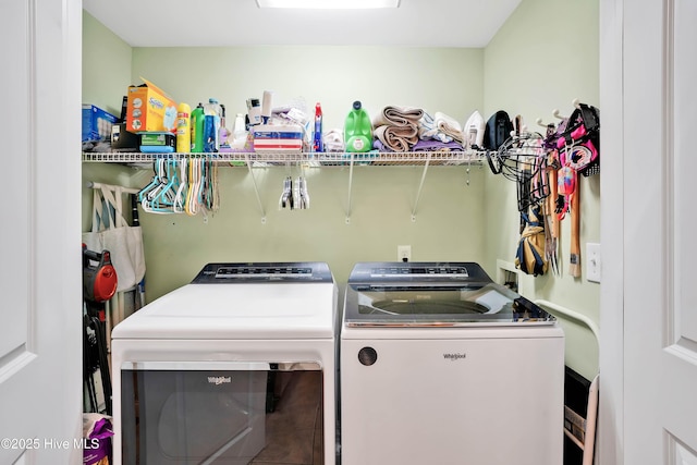 laundry area with washing machine and dryer and laundry area