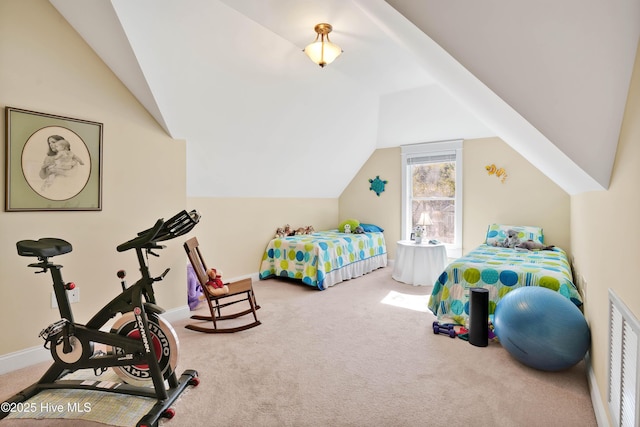 carpeted bedroom featuring baseboards, visible vents, and vaulted ceiling