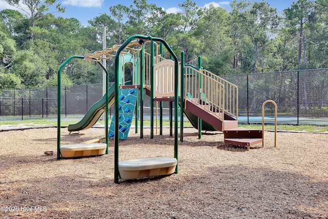 community jungle gym with fence