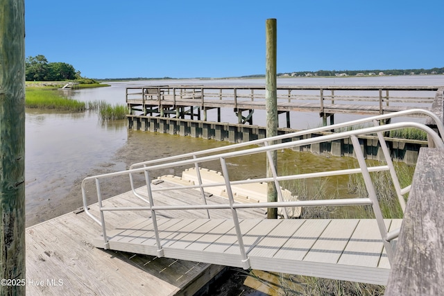 view of dock with a water view